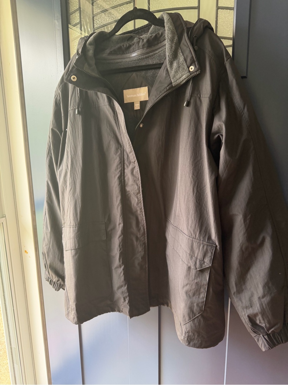 Woman Within Olive Green Hooded Raincoat